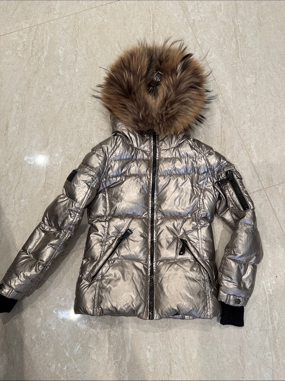 SAM. Metallic Silver Puffer Jacket with Faux Fur Trim